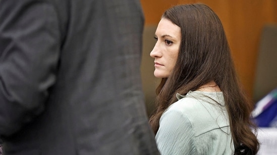 Lindsay Clancy watches the jury enter the room during her trial in Plymouth Superior Court, Plymouth, Massachusetts, U.S., August 17, 2026. Clancy is charged with murdering her three young children, Cora, Dawson and Callan, in their Duxbury home in 2023. Greg Derr/Pool via REUTERS REFILE - CORRECTING YEAR "2013" TO "2023".