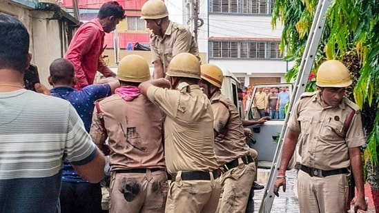Tarapith: Rescue personnel carry out operations after a fire broke out at a private hotel in Tarapith, in Birbhum district, West Bengal, Monday, (PTI)