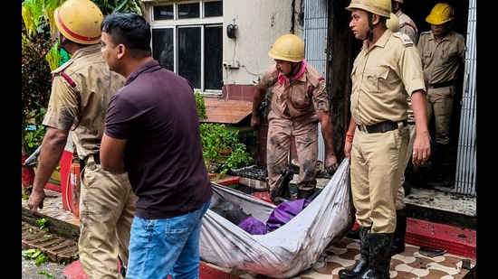 Police and fire brigade officials found the victims’ bodies on staircases and in the corridors. (PTI)