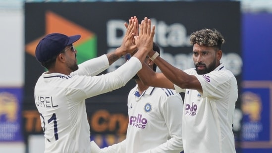 India's Mohammed Siraj celebrates the dismissal of Sri Lanka's Nishan Madushka with teammates during the day three of the first cricket test match (AP Photo/Eranga Jayawardena)