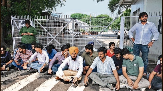 Students during the protest outside the V-C office in Panjab University, Chandigarh, on Monday (Keshav Singh/HT)