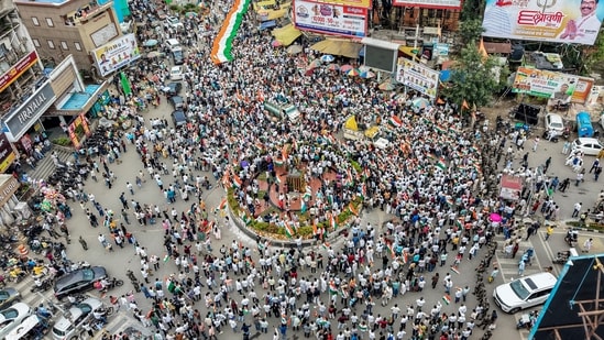 A drone view shows job aspirants and students taking out a massive 'Tiranga Yatra' procession to protest against the Jharkhand government over the JPSC and JSSC-CGL exam paper leak issues, in Ranchi on Saturday. (PTI)