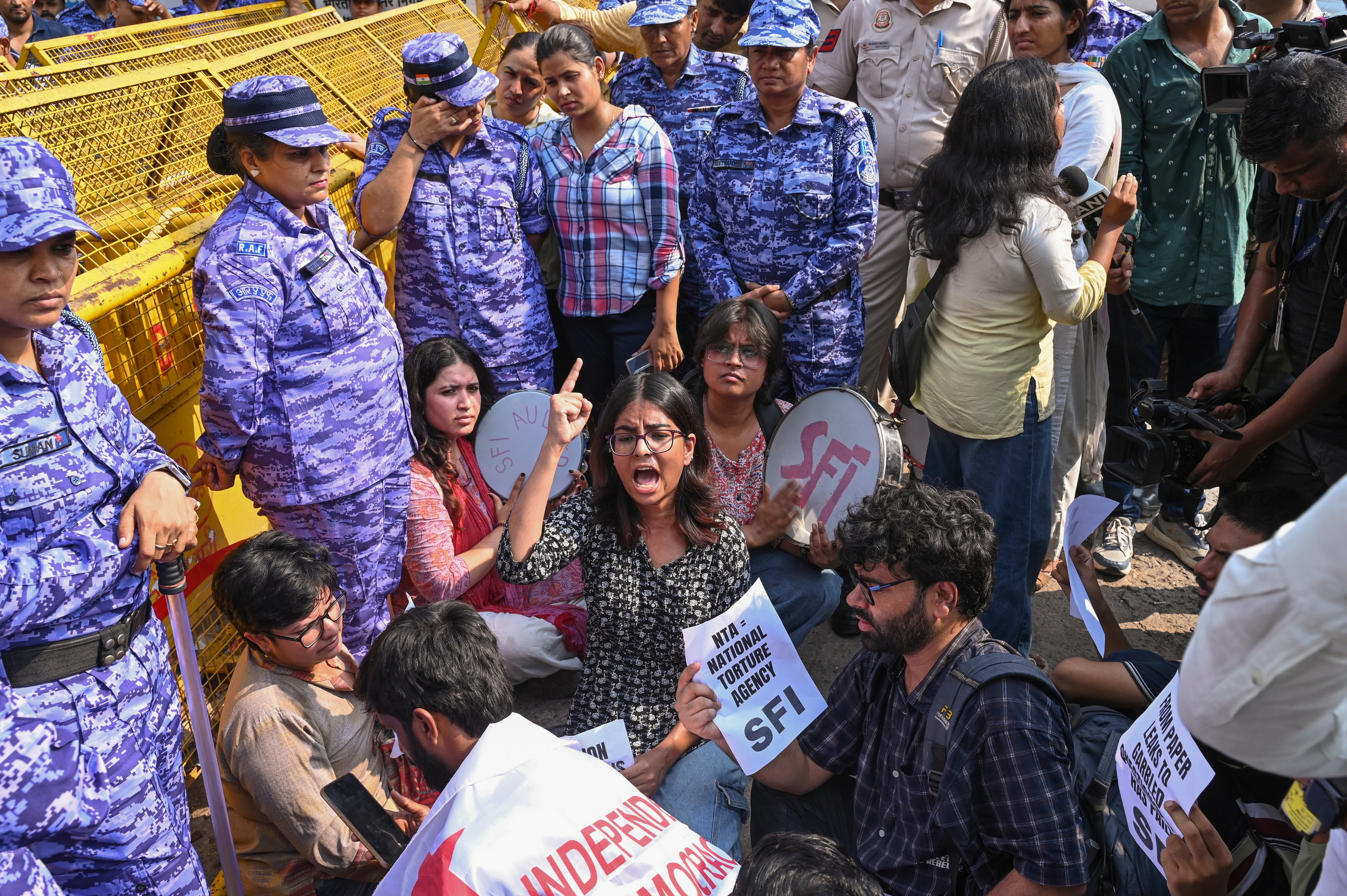 Students' Federation of India (SFI) activists stage a protest outside the National Testing Agency (NTA) headquarters in New Delhi over irregularities in the UGC-NET June 2026 examination. (PTI) Students' Federation of India (SFI) activists stage a protest outside the National Testing Agency (NTA) headquarters in New Delhi over irregularities in the UGC-NET June 2026 examination. (PTI)
