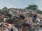 A garbage secondary collection point in Khandsa with accumulated waste. (Parveen Kumar/HT PHOTO)