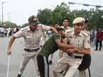 Police personnel carry out a lathi charge on protesters during the protest march against the alleged NEET paper leak from Jantar Mantar to Parliament House.