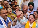 BJP leaders and workers raise slogans during a protest rally against the National Conference government, in Jammu on Monday. (ANI)