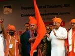 Jammu and Kashmir Lieutenant Governor Manoj Sinha flags off the first batch of pilgrims for the 'Budha Amarnath Yatra', in Jammu on Monday. (PTI)