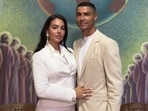 Minimal white suit. Maximum diamonds. Georgina Rodriguez said 'I do' to Cristiano Ronaldo, wearing Chopard jewellery. (Instagram/ voguemagazine)
