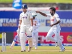 Sri Lanka's Asitha Fernando celebrates after taking the wicket of India's Yashasvi Jaiswal on day four of the first test cricket match