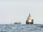 Containerships anchor near the Bab al-Mandeb Strait off Yemen’s coast in the Gulf of Aden.
