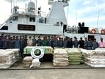 In this photo dated November 25, 2024, the Indian Coast Guard are seen with 5,500 kgs of prohibited drug Methamphetamine seized from a Myanmarese boat.