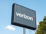 The Verizon logo is displayed at a Verizon store on July 24, Texas.