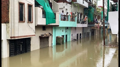 A view of a waterlogged residential area after heavy rainfall in Gaus Nagar, in Prayagraj on Tuesday. (ANI Video Grab) A view of a waterlogged residential area after heavy rainfall in Gaus Nagar, in Prayagraj on Tuesday. (ANI Video Grab)