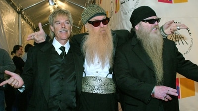 ZZ Top drummer Frank Beard, from left, lead singer and guitarist Billy F. Gibbons and bass player Dusty Hill appear at  the 19th Annual Rock and Roll Hall of Fame induction ceremony in New York on March 15, 2004. (AP Photo/Tina Fineberg)