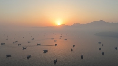 A drone view shows vessels in the Strait of Hormuz, as seen from Musandam, Oman, June 15, 2026. (REUTERS)