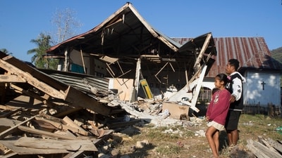 People inspect earthquake-damaged houses in North Lamba Leda, East Nusa Tenggara province, Indonesia, Tuesday, Aug. 18, 2026. (AP) People inspect earthquake-damaged houses in North Lamba Leda, East Nusa Tenggara province, Indonesia, Tuesday, Aug. 18, 2026. (AP)