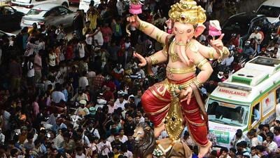 Mumbai, India – 16 June 2026: Devotees carrying Idol Ganesh Lord to the Pandal from the Ganesh Workshop, in Mumbai, India, on Sunday 16 June 2026. (Photo by Bhushan Koyande/HT Photo) Mumbai, India – 16 June 2026: Devotees carrying Idol Ganesh Lord to the Pandal from the Ganesh Workshop, in Mumbai, India, on Sunday 16 June 2026. (Photo by Bhushan Koyande/HT Photo)