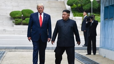 (FILES) North Korea's leader Kim Jong Un and US President Donald Trump cross south of the Military Demarcation Line that divides North and South Korea, after Trump briefly stepped over to the northern side, in the Joint Security Area (JSA) of Panmunjom in the Demilitarized zone (DMZ) on June 30, 2019. South Korea's defence ministry said August 17, 2026 that its joint military exercise with the United States has started after President Donald Trump's announcement it would be scaled back. Trump said he was "not happy" about US participation in the joint military exercises and is scaling back the drills aimed at deterring rival North Korea. (AFP)