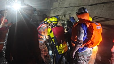 The search for the lone missing worker continued.