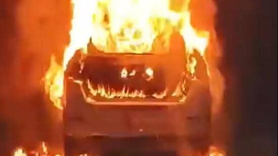 Official said locals alerted them around 11pm that a moving Maruti Suzuki WagonR CNG variant had burst into flames near the Sector 100 villas. (HT Photos/Videograb)