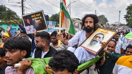 Student leader Devendra Nath Mahto being carried during a march towards Jharkhand Assembly amid a protest over alleged irregularities in the 14th JPSC examination. (PTI)