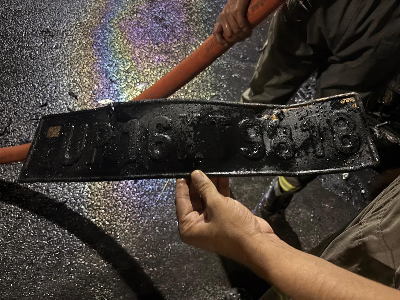 The car number plate in damaged state. (HT) The car number plate in damaged state. (HT)