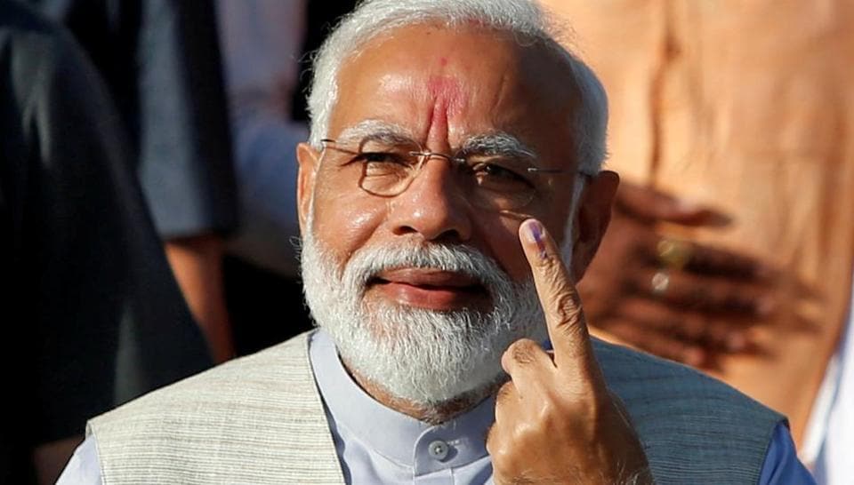 Prime Minister Narendra Modi shows his ink-marked finger after casting his vote outside a polling station during the third phase of general election in Ahmedabad, India, April 23, 2019. (REUTERS) Prime Minister Narendra Modi shows his ink-marked finger after casting his vote outside a polling station during the third phase of general election in Ahmedabad, India, April 23, 2019. (REUTERS)