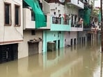 A view of a waterlogged residential area after heavy rainfall in Gaus Nagar, in Prayagraj on Tuesday. (ANI Video Grab)