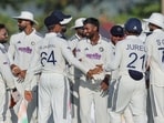 India's Manav Suthar and teammate celebrate the wicket of Sri Lanka's Lahiru Udara on day 4 of the 1st Test match, at Galle International Stadium 