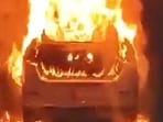 Official said locals alerted them around 11pm that a moving Maruti Suzuki WagonR CNG variant had burst into flames near the Sector 100 villas. (HT Photos/Videograb)