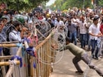 Successful candidates enter Jharkhand secretariat campus protesting exam cancellations(PTI)