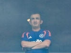 India's coach Gautam Gambhir waits amid a match delay. India's coach Gautam Gambhir waits amid a match delay.