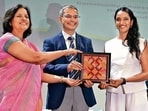 Punjab DGP Gaurav Yadav and special DGP (community affairs division) Gurpreet Kaur Deo felicitating a participant during a training programme under the gender sensitisation project ‘Mainstreaming of Women at the Punjab Police Academy in Phillaur on Tuesday. (Gurpreet Singh/HT)