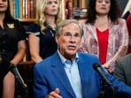 Texas Gov. Greg Abbott speaks at a press conference addressing foreign influence in public education at the Texas Public Policy Foundation in Austin, (Sara Diggins/The San Antonio Express-News via AP)