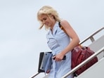 White House aide Natalie Harp disembarks Air Force One, Sunday, Aug. 16, 2026, at Joint Base Andrews, Md. (AP Photo/Julia Demaree Nikhinson)