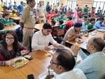 Unnao DM Ghanshyam Meena and SP Jai Prakash Singh had breakfast with the students and assured them that their problems would be looked into. (HT)
