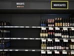 Empty space on a shelf where American-made liquor had been at a store in Montreal.