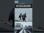 Watch: Long Line of Vehicles Stranded as Snow Blocks Bolivia’s La Paz–Yungas Road