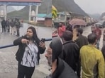 The woman was seen arguing with the security personnel at the checkpoint.
