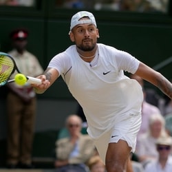Australia's Nick Kyrgios returns to Serbia's Novak Djokovic in the final of the men's singles during the Wimbledon tennis championships in London, July 10, 2022