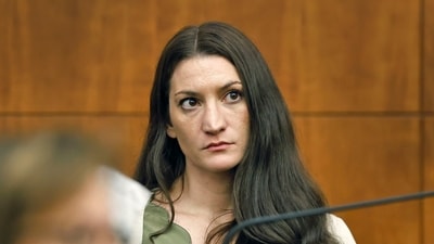 Lindsay Clancy's trial revealed support from Father Bob, a priest visiting her at the courthouse. (Greg Derr/Pool The Patriot Ledge) Lindsay Clancy's trial revealed support from Father Bob, a priest visiting her at the courthouse. (Greg Derr/Pool The Patriot Ledge)