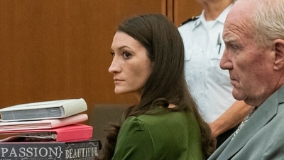 Lindsay Clancy sits in court with her attorney Kevin Redinngton during her murder trial Wednesday, Aug. 19. (Amanda Sabga/Pool The Boston Her)