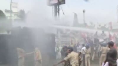 Bihar Police use water cannon to disperse crowd raising issue of paper leak, unemployment. (Screengrab@ANI)