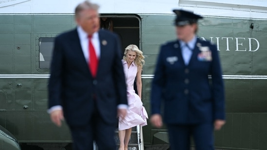 Natalie Harp, aide to US President Donald Trump, steps off Marine One as President Trump walks to board Air Force One at Joint Base Andrews, Maryland, on July 27, 2026. Trump is traveling to Milford, Michigan to deliver remarks at General Motors’ vehicle testing site Milford Proving Ground.