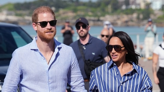 Prince Harry, and Meghan, the Duke and Duchess of Sussex, arrive for an event, during a visit to Bondi Beach, Australia, April 17. (Jonathan Brady/Pool PA via AP)