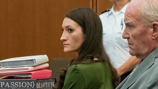 Lindsay Clancy sits in court with her attorney Kevin Redinngton during her murder trial Wednesday, Aug. 19.