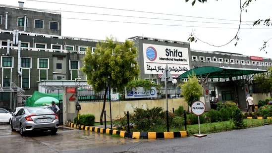 A car enters Shifa International Hospital, after the Supreme Court ordered authorities to move jailed former prime minister Imran Khan to the hospital, in Islamabad, Pakistan.