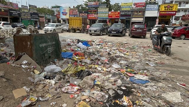 Illegally dumped garbage in the Sector 22A market, seen on Tuesday. (Parveen Kumar/HT)