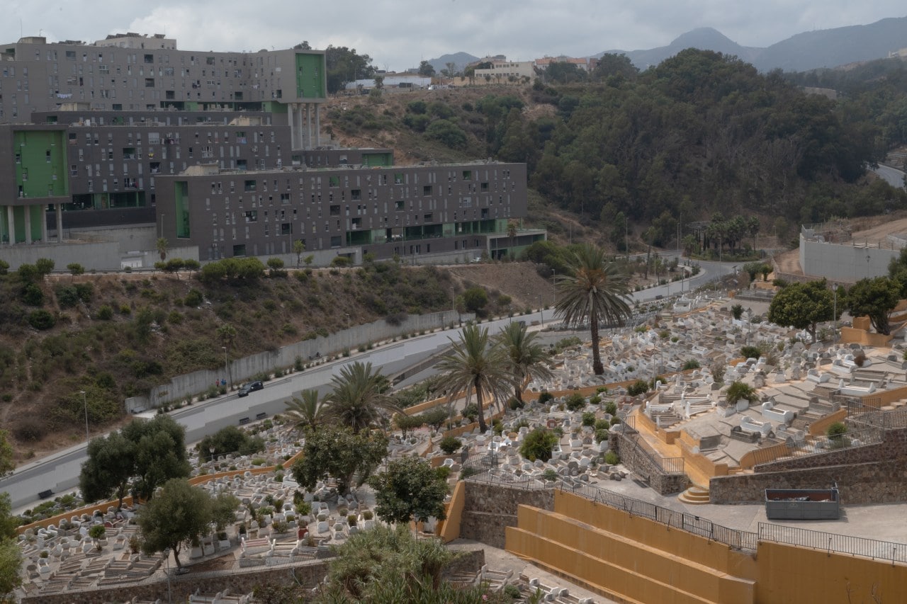 Social-housing units sit across from a cemetery in Ceuta. Social-housing units sit across from a cemetery in Ceuta.