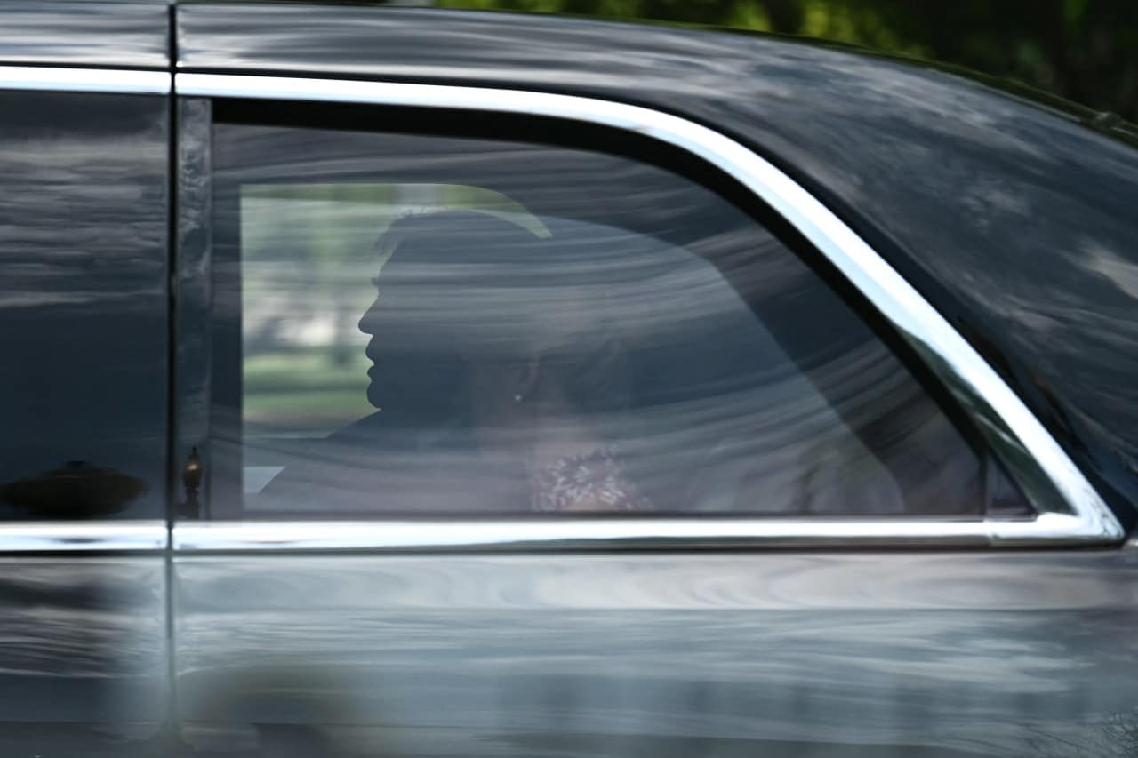Trump rides in his motorcade with Harp in Washington. Trump rides in his motorcade with Harp in Washington.